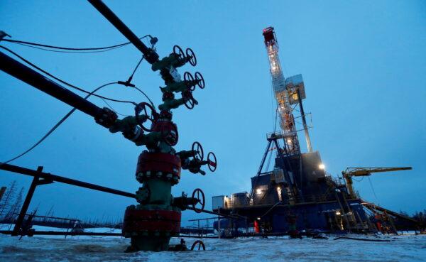 A wellhead and drilling rig in the Yarakta oilfield, owned by Irkutsk Oil Company, in the Irkutsk region of Russia on Mar. 11, 2019. (Reuters/Vasily Fedosenko/File Photo)