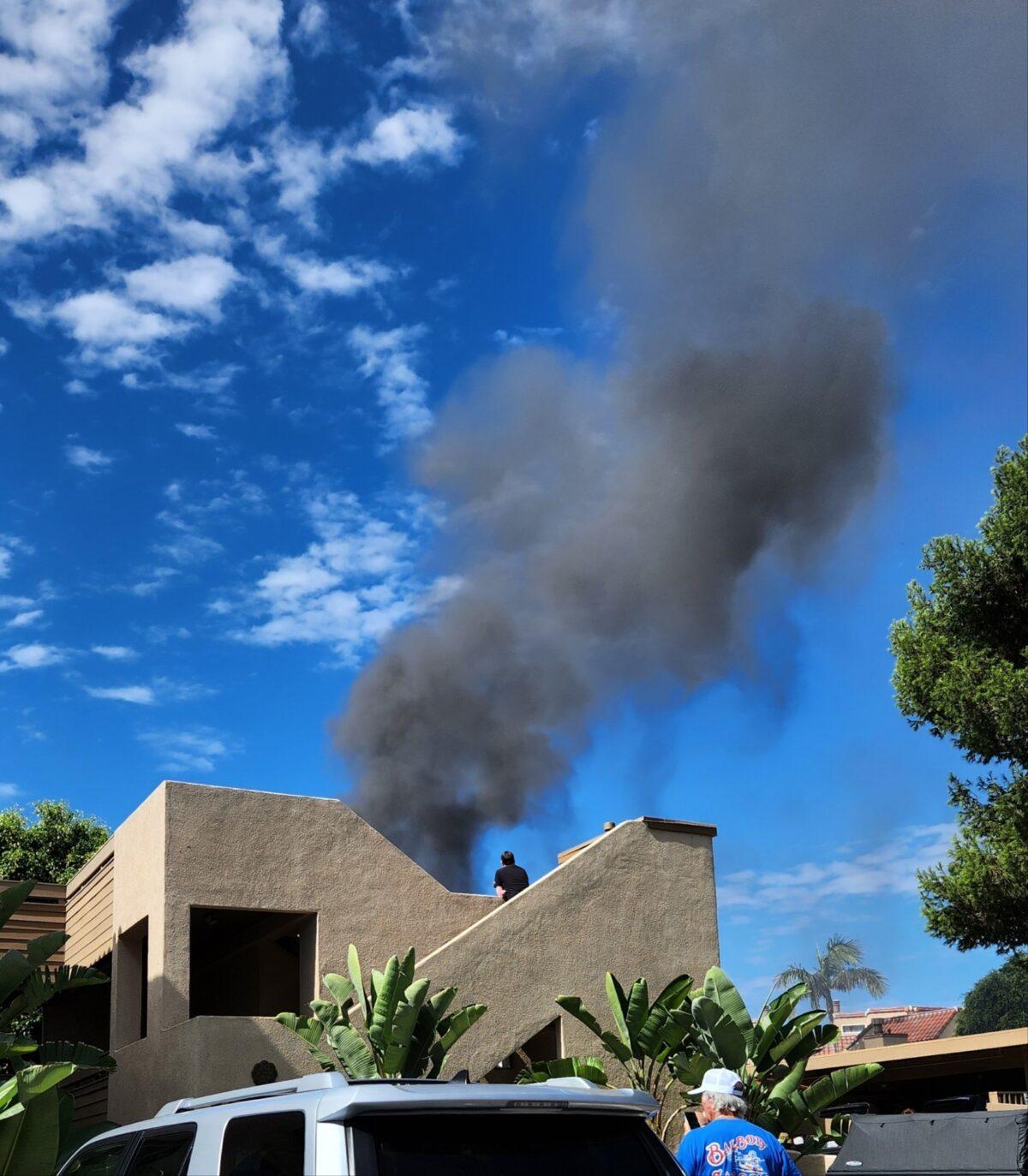 An apartment fire burns in Newport Beach, Calif., on Sept. 11, 2022. (Courtesy of Elizabeth Barden)