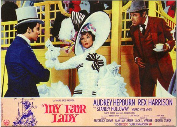 (L–R) Jeremy Brett as Freddy, Audrey Hepburn as Eliza Doolittle, and Rex Harrison as Professor Higgins meet at the Ascot races in "My Fair Lady." (MovieStillsDB)