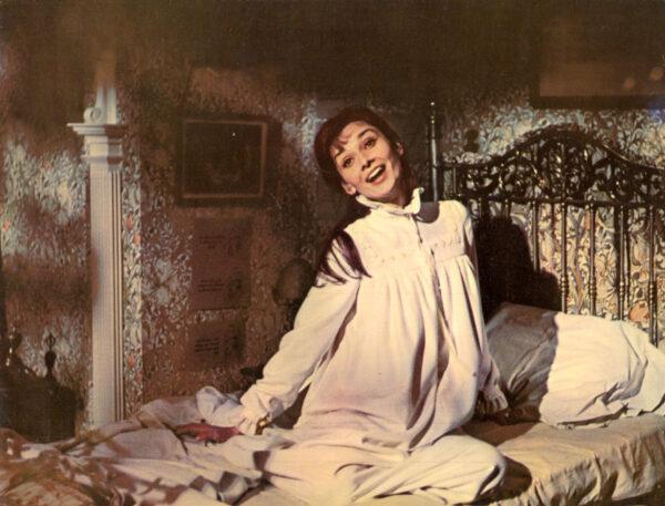 Audrey Hepburn as Eliza Doolittle sings "I Could Have Danced All Night," after achieving good diction in "My Fair Lady." (MovieStillsDB)
