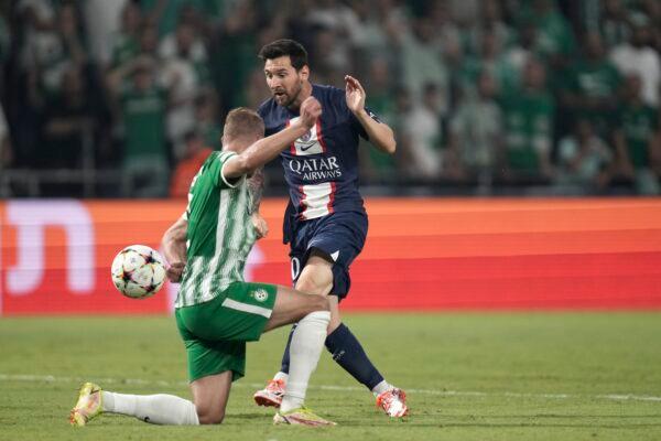 PSG's Lionel Messi clears the ball during the group H Champions League soccer match between Maccabi Haifa and Paris Saint-Germain in Haifa, Israel, on Sept. 14, 2022. (Ariel Schalit/AP Photo)