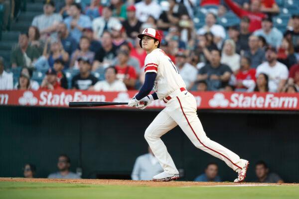 Shohei Ohtani of the Los Angeles Angels looks on as he hits an rbi double against the Seattle Mariners during the first inning at Angel Stadium of Anaheim in Anaheim, Calif., on September 17, 2022. (Michael Owens/Getty Images)