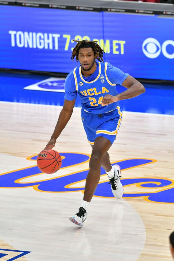 Jalen Hill #24 of the UCLA Bruins looks for a pass during the second half against the Ohio State Buckeyes at Rocket Mortgage Fieldhouse in Cleveland, Ohio, on Dec. 19, 2020. (Jason Miller/Getty Images)