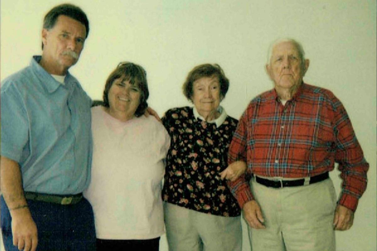 (L–R) Larry, his sister, mom, and dad at Ironwood State Prison in Blythe, California. This was taken in the visiting room while Larry was serving his 13-year sentence. (Courtesy of Larry Clements)
