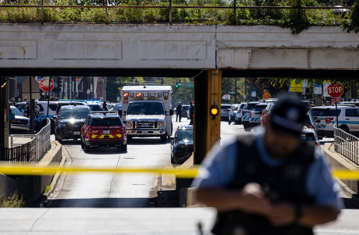 Chicago police respond to a shooting near the CPD Homan Square facility in Chicago on Sept. 26, 2022. (Brian Cassella/Chicago Tribune via AP)