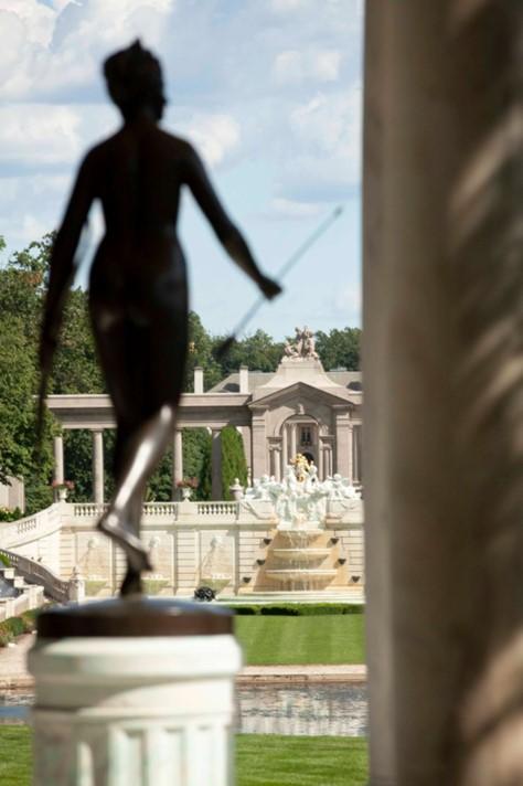 A sculpture of Diana, the patroness of the countryside, hunting and the moon surveys the grand fountain, colonnade, and mansion beyond. (J.H.Smith/Cartiophotos)