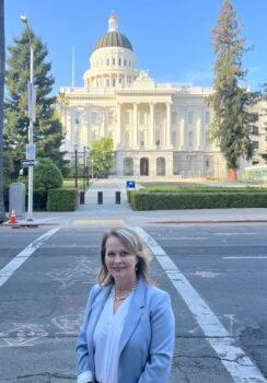 Susan Arnall, vice president of legal affairs at the Right to Life League, stands across the street from the California state capital in June 2022. (Courtesy of Susan Arnall)