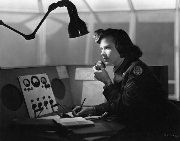 Kim Hunter as radio operator June takes a communication from Peter Carter as his plane burns up midair off the English coast in "Stairway to Heaven." (MovieStillsDB)