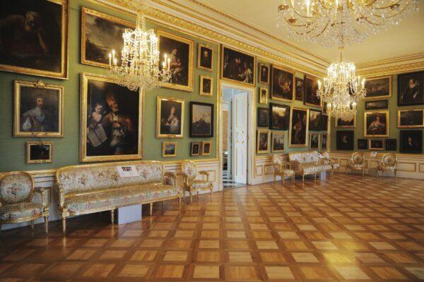 In the Palace on the Isle, the king kept many of his important artworks close to him in The Picture Gallery of his private apartments. Paintings are hung, per 18th-century tradition, on a green wall and with the pictures taking up every piece of wall space. A total of 140 paintings are on display in the palace. (Royal Lazienki Museum)