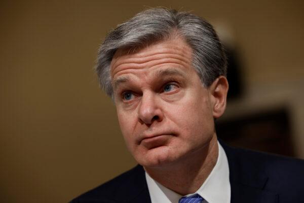 FBI Director Christopher Wray prepares to testify before the House Homeland Security Committee in the Cannon House Office Building on Capitol Hill on Nov. 15, 2022. (Chip Somodevilla/Getty Images)