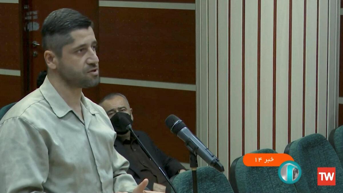 Seyyed Mohammad Hosseini speaks in a courtroom in Tehran, Iran, in December 2022. (West Asia News Agency/Handout via Reuters)