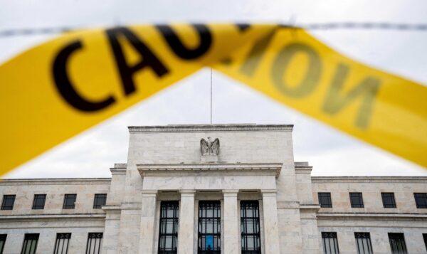 The Federal Reserve building is seen past caution tape in Washington, D.C., on Sept. 19, 2022. (Stefani Reynolds/AFP via Getty Images)