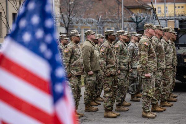 U.S. soldiers attend an inauguration ceremony by transforming the Area Support Group Poland into the permanent U.S. Army Garrison Poland, at Camp Kosciuszko in Poznan, Poland, on March 21, 2023. (Wojtek Radwanski/AFP via Getty Images)