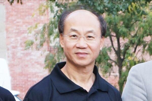 Litang Liang in Boston Chinatown in 2017. (Jianyu Huang/The Epoch Times)