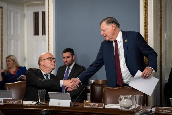 (L-R) Committee ranking member Rep. Jim McGovern (D-Mass.) shakes hands with committee chairman Rep. Tom Cole (R-Okla.) as they arrive for a House Rules Committee in Washington, D.C., on May 9, 2023. (Drew Angerer/Getty Images)