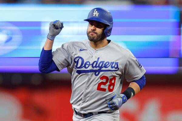 J.D. Martinez (28) of the Los Angeles Dodgers reacts as he rounds second base following a three run home run during the ninth inning against the Atlanta Braves at Truist Park in Atlanta on May 23, 2023. (Todd Kirkland/Getty Images)