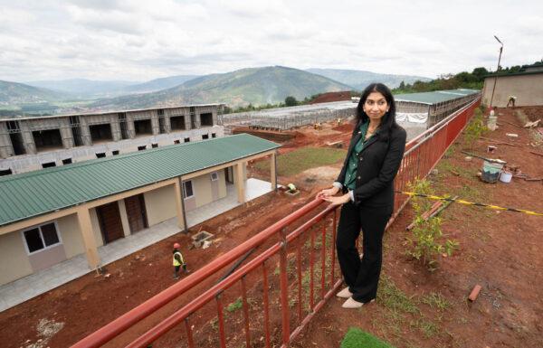 Home Secretary Suella Braverman tours a building site on the outskirts of Kigali during her visit to Rwanda, to see houses that are being constructed that could eventually house deported migrants from the UK, on March 18, 2023. (PA)