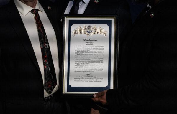 Veterans hold Westminster's proclamation for "Massoud Day" in Westminster, Calif., on May 24, 2023. (John Fredricks/The Epoch Times)