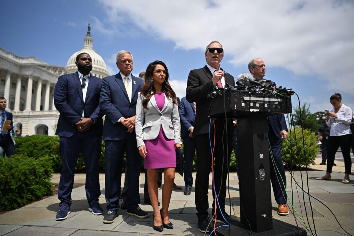 Rep. Andy Biggs (R-Ariz.), joined by members of the House Freedom Caucus, speaks on the debt limit deal outside the U.S. Capitol in Washington, on May 30, 2023. (Mandel Ngan/AFP via Getty Images)