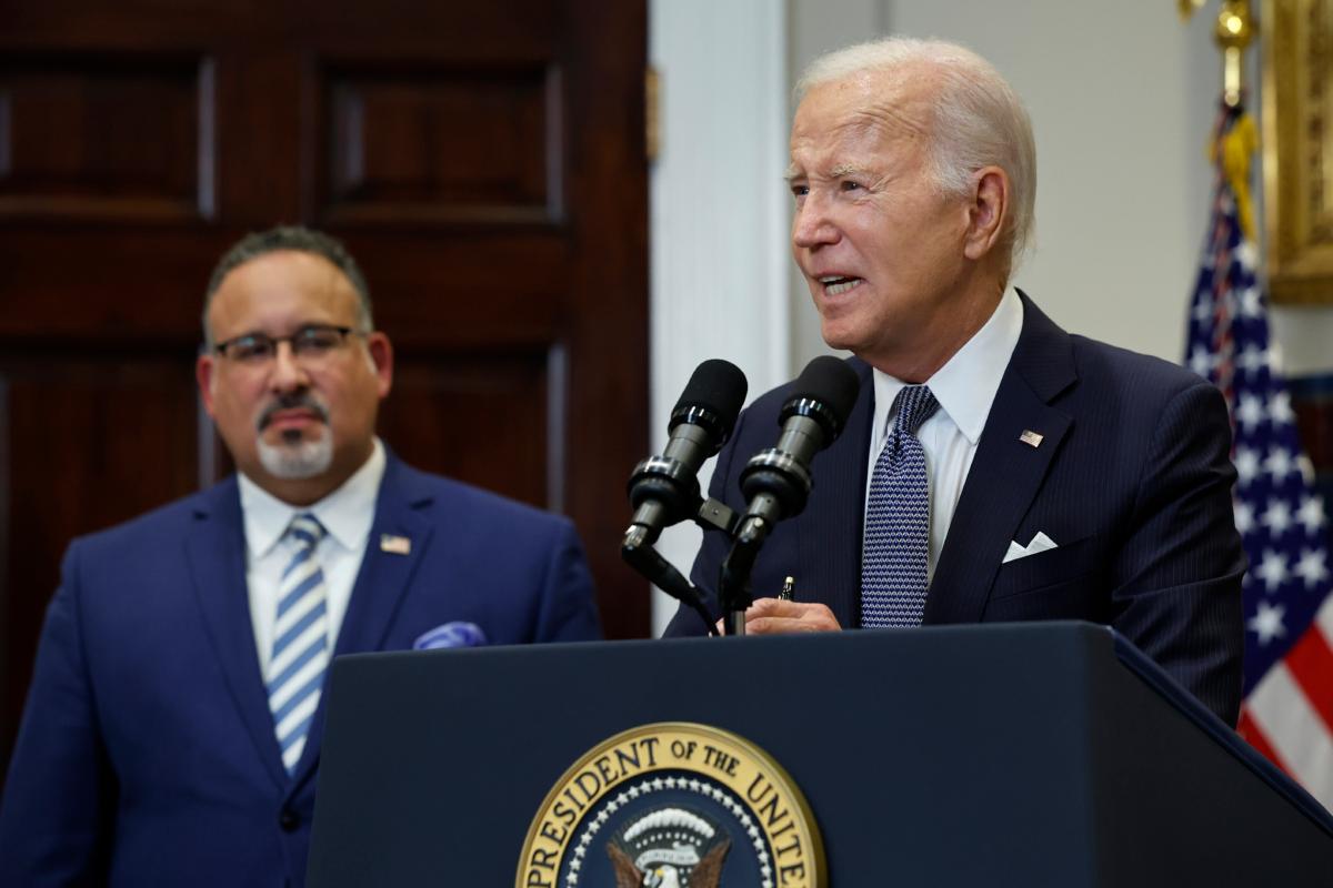 President Joe Biden is joined by Education Secretary Miguel Cardona as he announces new actions to protect borrowers after the Supreme Court struck down his student loan forgiveness plan in the Roosevelt Room at the White House on June 30, 2023. (Chip Somodevilla/Getty Images)