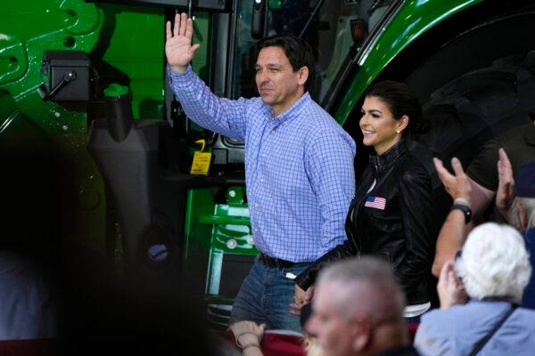 Republican presidential candidate and Florida Gov. Ron DeSantis and his wife, Casey, walk to the stage during the “Roast and Ride” event in Des Moines, Iowa, on June 3, 2023. (Charlie Neibergall/AP Photo)