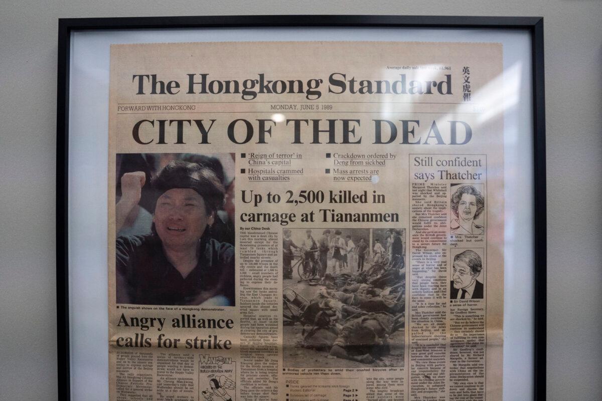 A newspaper cover on June 5, 1989, is on display at the June 4 Memorial Exhibit in New York on June 4, 2023. (Chung I Ho/The Epoch Times)