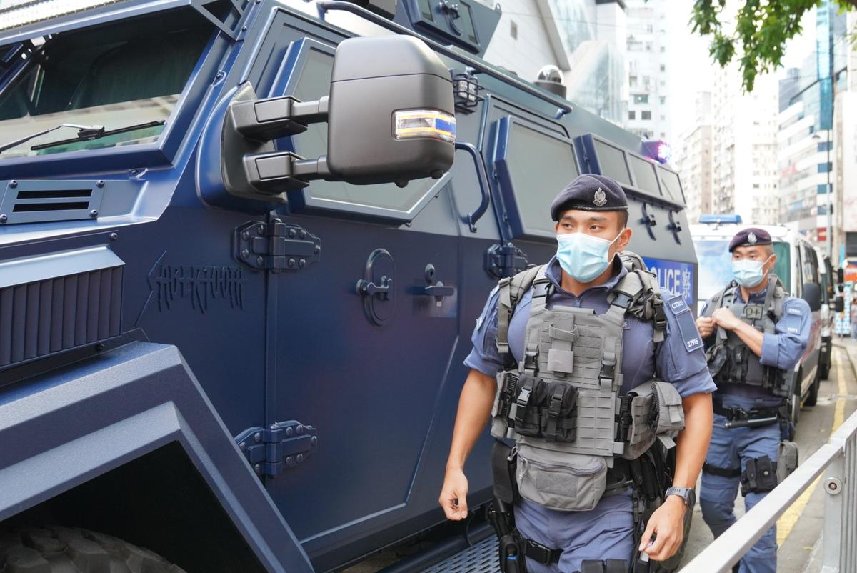The Hong Kong Police Force deployed thousands of officers to stand by and guard around Victoria Park, Causeway Bay MTR exits, and Sogo Department Store. Military-grade Sabertooth armored vehicles were also seen, in Hong Kong, on June 4, 2023.  (Adrian Yu /The Epoch Times)