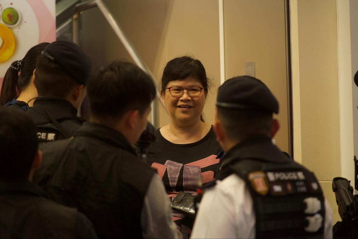 The former Chairperson of the Hong Kong Journalist Association, Mak Yin-ting, was taken away by the authorities in Hong Kong on June 4, 2023. (Benson Lau/The Epoch Times)