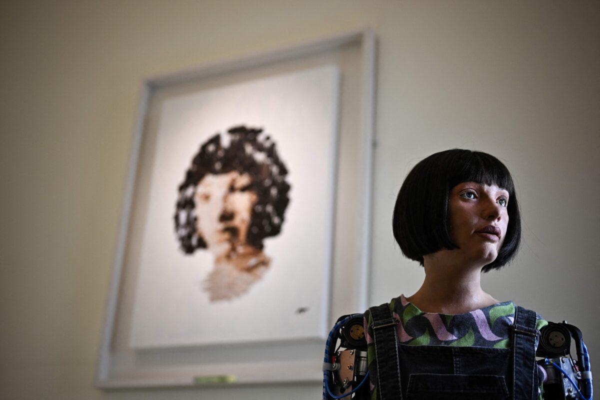 Gates, Musk, Zuckerberg Descend on DC for Closed-Door Senate AI Hearing | USNN World News Ultra-realistic AI robot Ai-Da poses in front of a painting it made during the press preview of the London Design Biennale 2023 at Somerset House, central London, on June 1, 2023. (Ben Stansall/AFP via Getty Images)