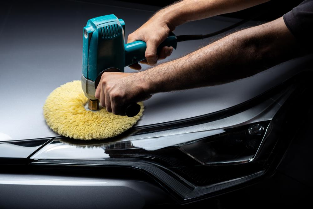 Polishing the car does more than keep it shiny; it also protects the paint and helps preserve the car’s value. (Bhakpong/Shutterstock)