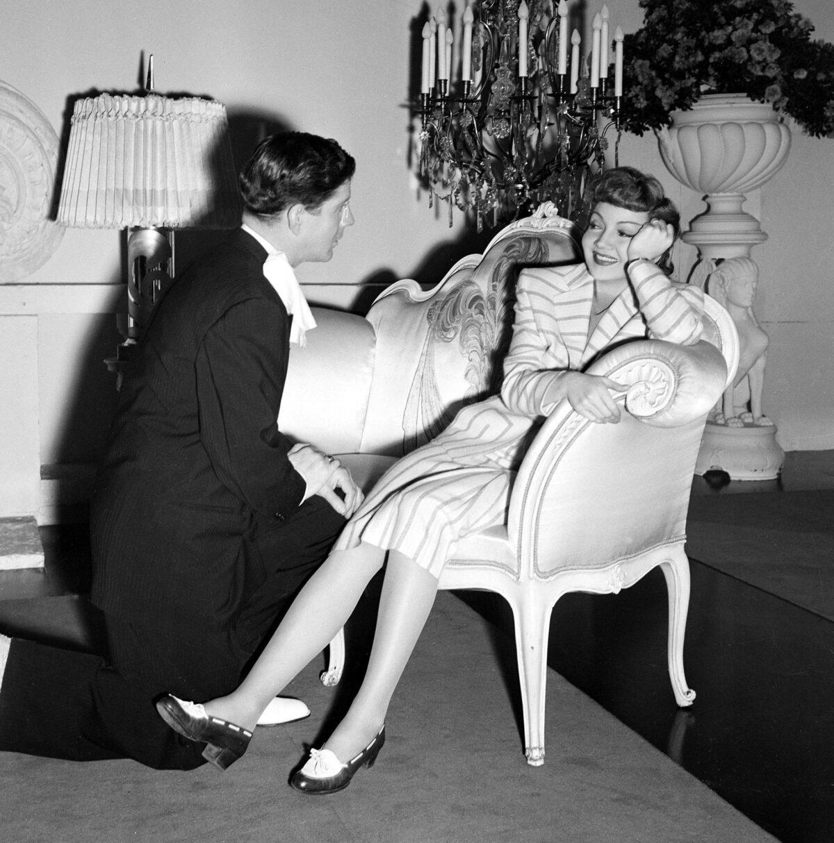 "The Palm Beach Story" behind the scenes photo with Rudy Vallee and Claudette Colbert. (MovieStillsDB)