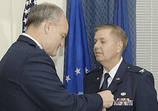 U.S. Air Force Reserve Col. and Sen. Lindsey Graham (R-SC), here receiving a Meritorious Service Medal in an April 2009 Pentagon ceremony, was awarded a Bronze Star in 2014 for his performance as an Air Force attorney during active-duty stints in Iraq and Afghanistan. (U.S. Air Force)