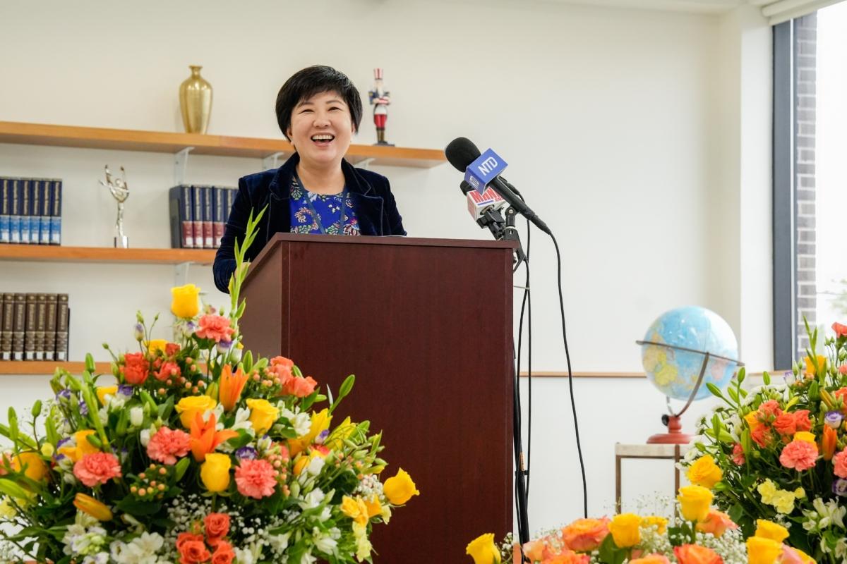 Sherry Yin, executive vice president of business of Gan Jing World, speaks at the opening ceremony of its first headquarters building, dubbed "MT0" or "Middletown Zero," in Middletown, N.Y., on June 22, 2023. (Samira Bouaou/The Epoch Times)