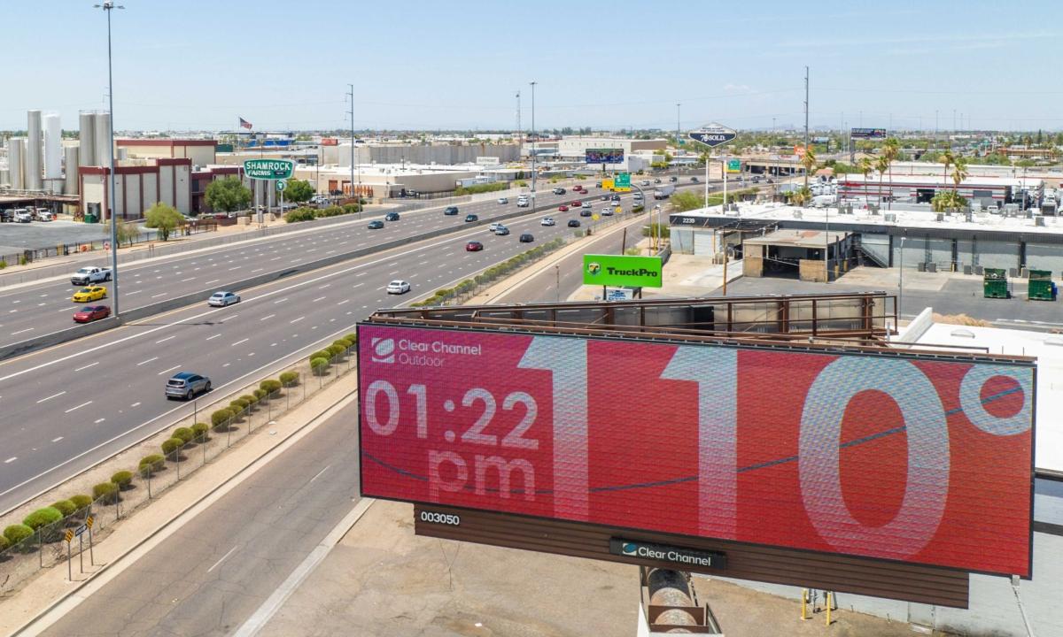 A billboard displays the temperature, which was forecast to reach 115 degrees Fahrenheit, in Phoenix on July 16, 2023. (Brandon Bell/Getty Images)
