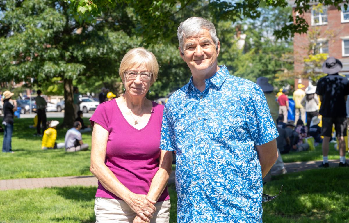 Al Beers (L) and his wife Petra Beers at a rally calling for an end to the persecution of Falun Gong in China in Goshen, N.Y., on July 22, 2023. (Cara Ding/The Epoch Times)