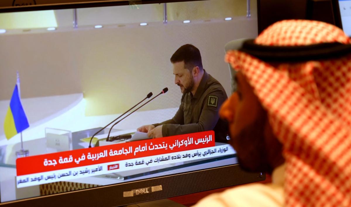 Media delegates watch Ukraine's President Volodymyr Zelenskyy addressing the Arab League Summit in Jeddah on May 19, 2023.  (Fayez Nureldine/AFP via Getty Images)
