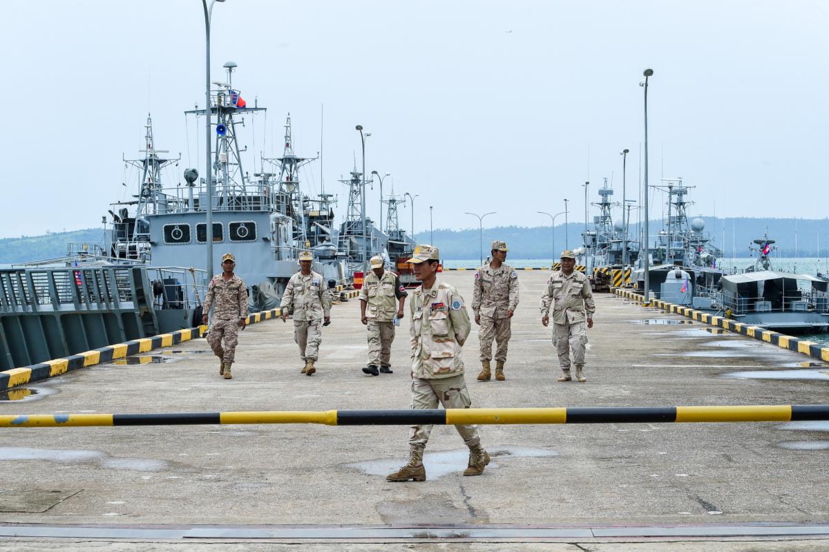 Members of the Cambodian Navy walk on a jetty in Ream Naval Base, Cambodia, on July 26, 2019. (Tang Chhin Sothy/AFP via Getty Images)
