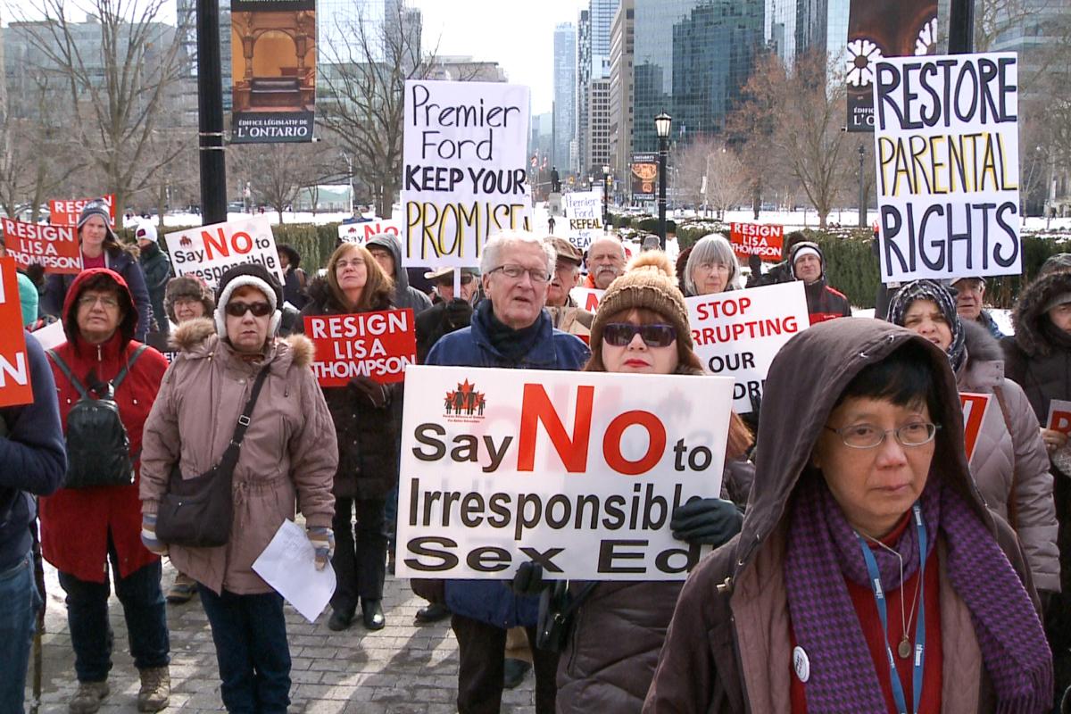 People gather to call on Premier Doug Ford to keep his promise to repeal the controversial 2015 sex education curriculum and for Education Minister Lisa Thompson to resign at Queen’s Park in Toronto on Feb. 2, 2019. (NTD Television)