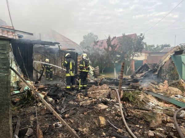 Rescuers work at a site of buildings damaged in the night by Russian drone and missiles strike, amid Russia's attack on Ukraine, in Kyiv region, Ukraine, on Aug. 30, 2023. (Press service of the State Emergency Service of Ukraine/Handout via Reuters)