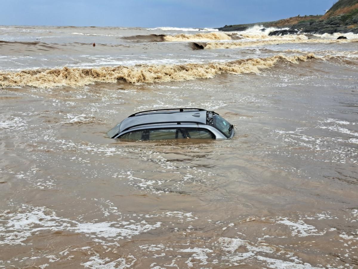 A car washed into the sea near Tsarevo at the Bulgarian Black Sea Coast after heavy rains led to flooding on Sept. 5, 2023. (Yordan Zhekov/AFP via Getty Images)