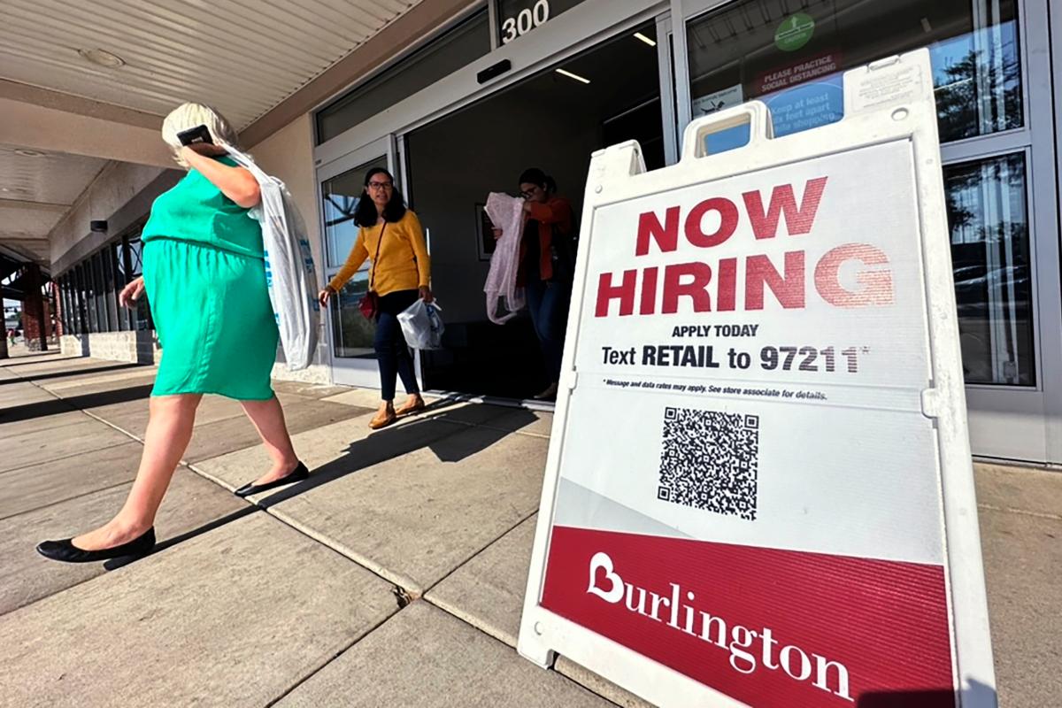 A hiring sign is displayed at a retail store in Vernon Hills, Ill., on Aug. 31, 2023. (Nam Y. Huh/AP Photo)