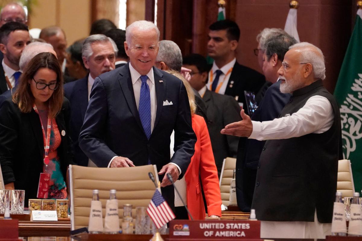 U.S. President Joe Biden (C) and Indian Prime Minister Narendra Modi (R) arrive for the first session of the G20 Leaders' Summit in New Delhi, on September 9, 2023. (Evan Vucci/AFP via Getty Images)