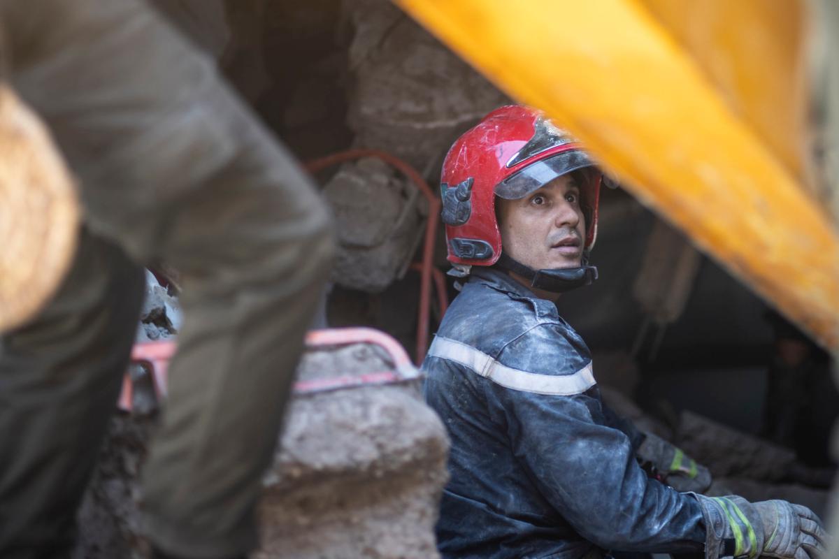 A rescue worker pauses while taking part in a rescue operation after a powerful earthquake, in Moulay Brahim village, near Marrakech, Morocco, on Sept. 9, 2023. (Mosa'ab Elshamy/AP Photo)
