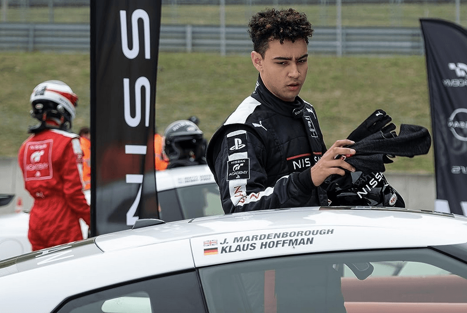 Jann Mardenborough (Archie Madekwe, C) is the best prospect in a group of untested rookie race car drivers, in "Gran Turismo." (Sony Pictures Releasing)