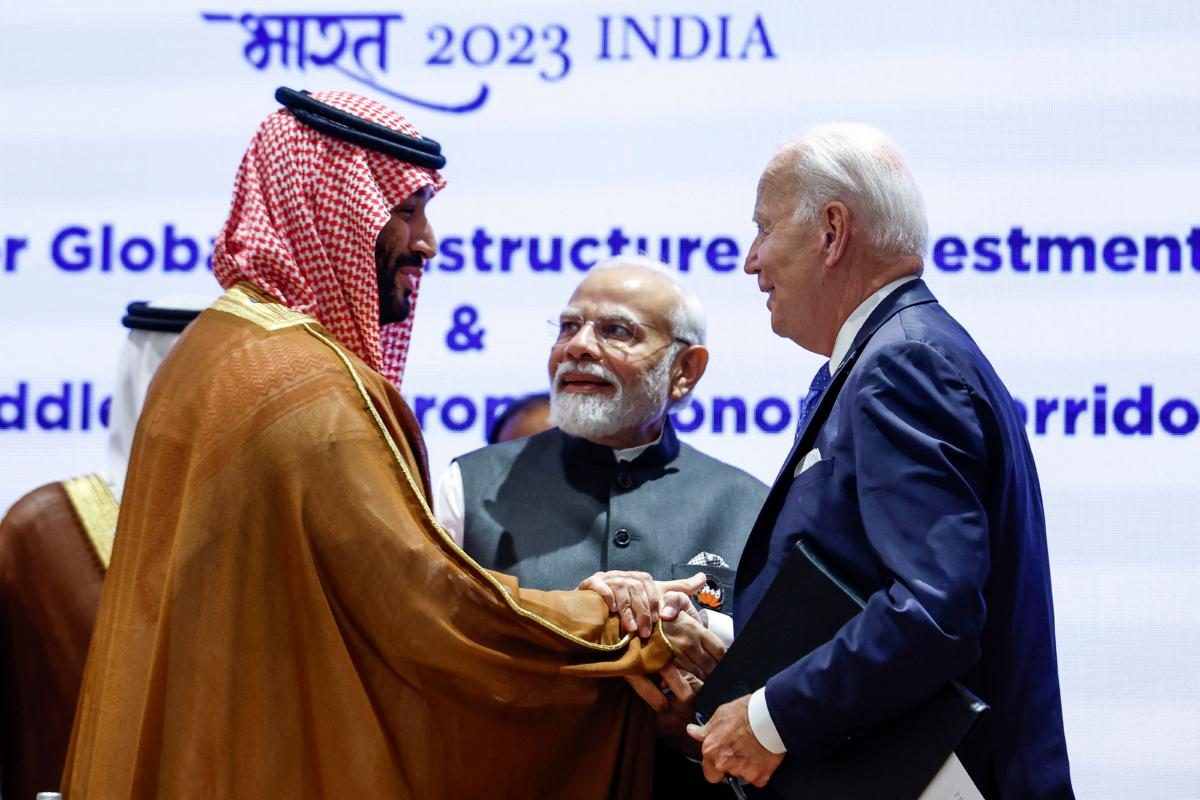 Saudi Arabian Crown Prince and Prime Minister Mohammed bin Salman (L), India's Prime Minister Narendra Modi (C), and U.S. President Joe Biden attend a session as part of the G20 Leaders' Summit at the Bharat Mandapam in New Delhi on Sept. 9, 2023. (Evelyn Hockstein/POOL/AFP via Getty Images)