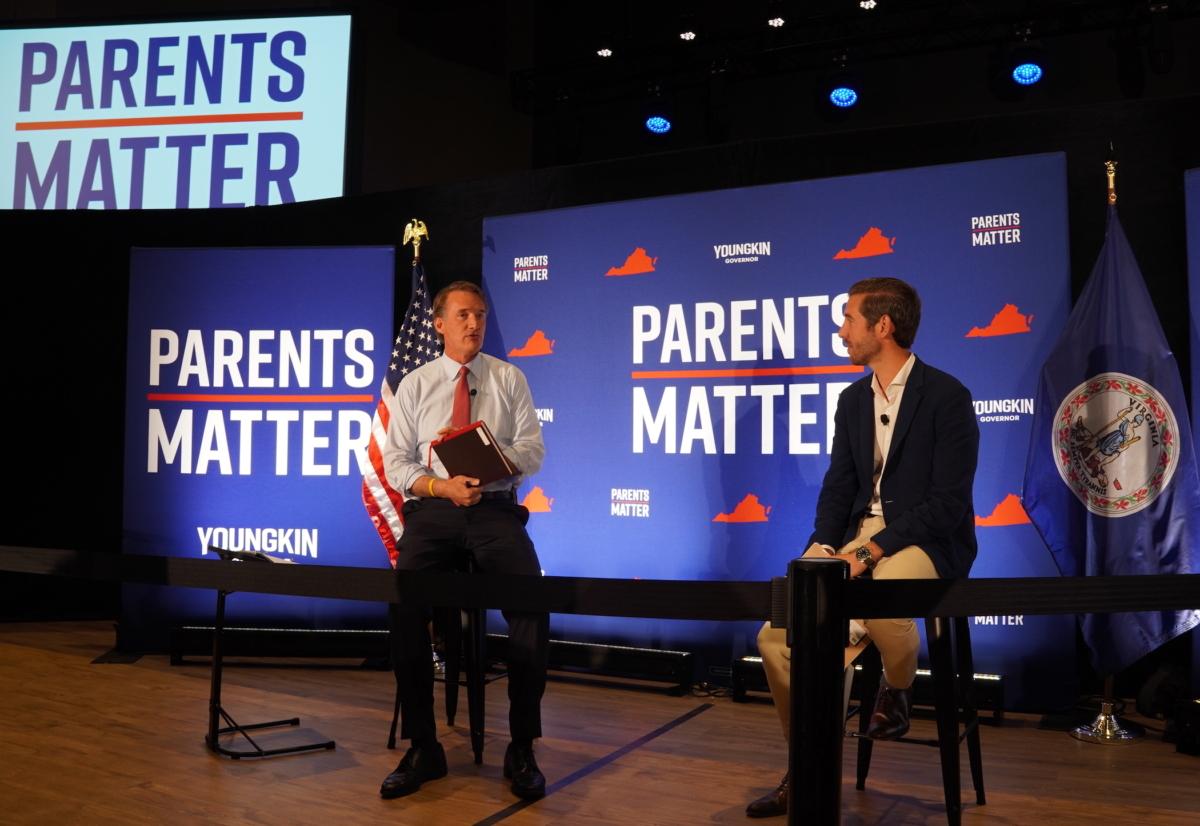 Virginia Gov. Glenn Youngkin (L) with Juan Pablo Segura, the Republican candidate for Virginia's 31st Senate District seat, at a "Parents Matter" townhall in Leesburg, Va., on Sept. 12, 2023. (Terri Wu/The Epoch Times)