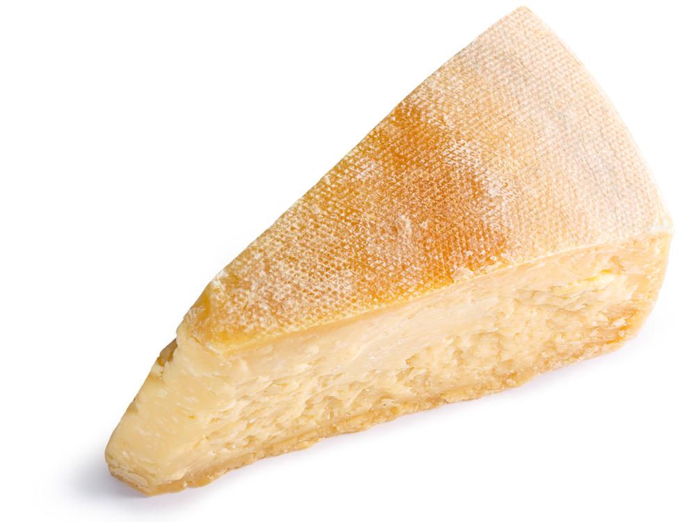 A hunk of a cheese rind is the surprise—and key—ingredient, which provides depth of flavor and body to the broth.(Hortimages/Shutterstock)