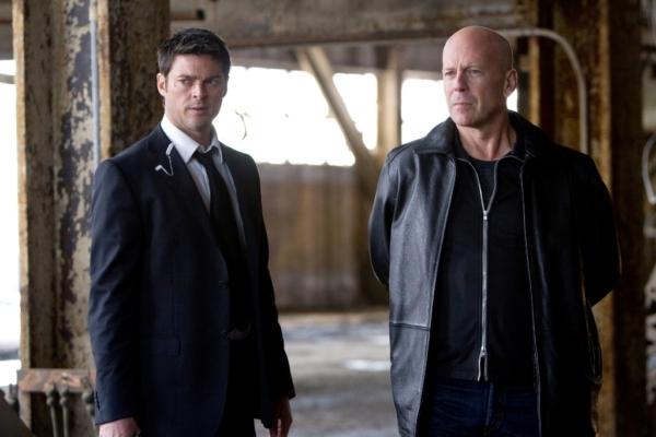 CIA agent William Cooper (Karl Urban, L) and (Frank Moses (Bruce Willis), in “RED.” (Summit Entertainment)