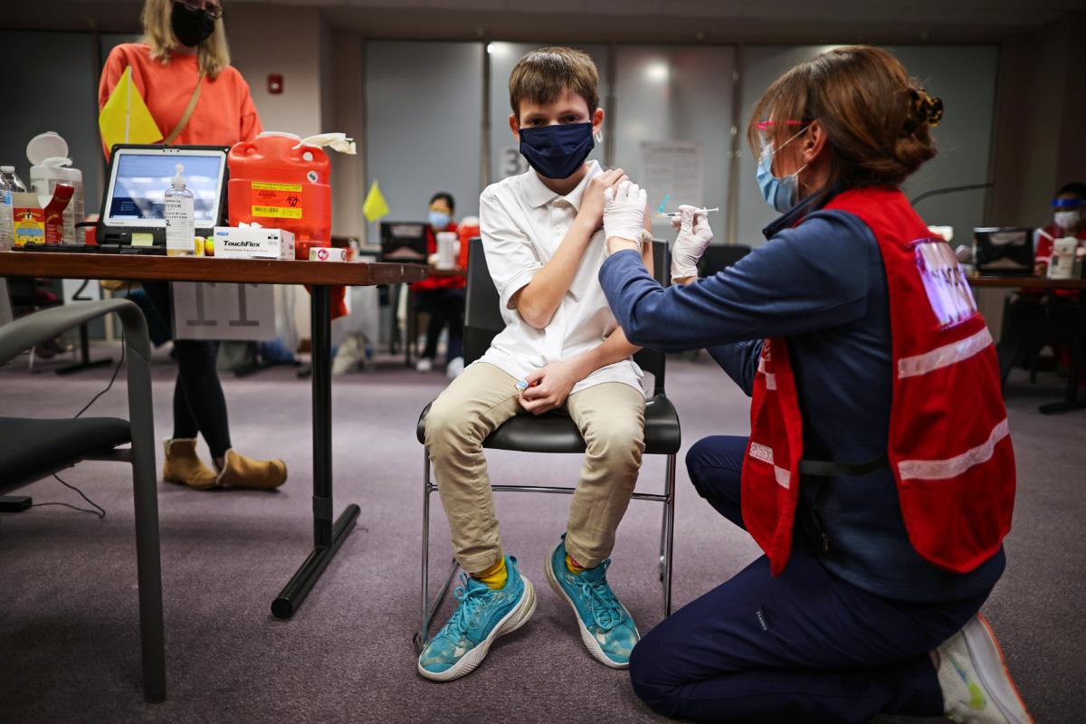 A child receives a dose of the Pfizer BioNTech COVID-19 vaccine at the Fairfax County Government Center in Annandale, Va., on Nov. 4, 2021. (Chip Somodevilla/Getty Images)