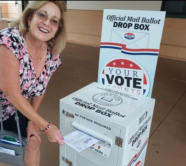 Sharon Demers, Republican State Committee Woman for Flagler County, drops her ballot in a drop box during the 2022 midterm elections in Flagler County, Florida (Courtesy of Susan Demers).